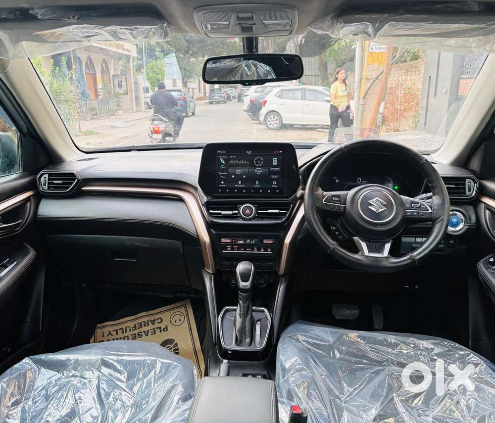Maruti Suzuki Grand Vitara 1.5 Zeta Plus Dual Tone Intelligent Hybri..