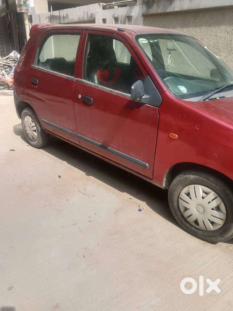 Brick Red Maruti Alto