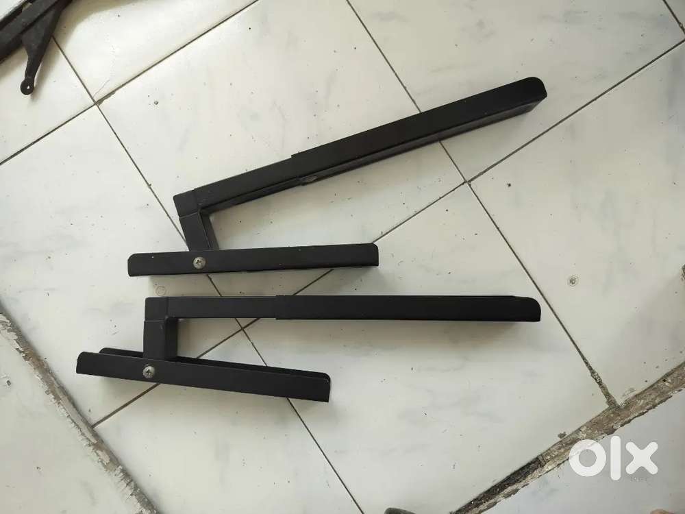 Wall mounted clamp