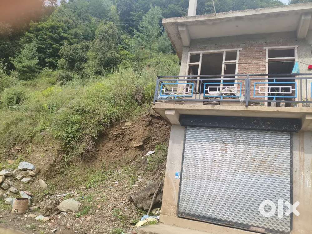 Half side of building with land