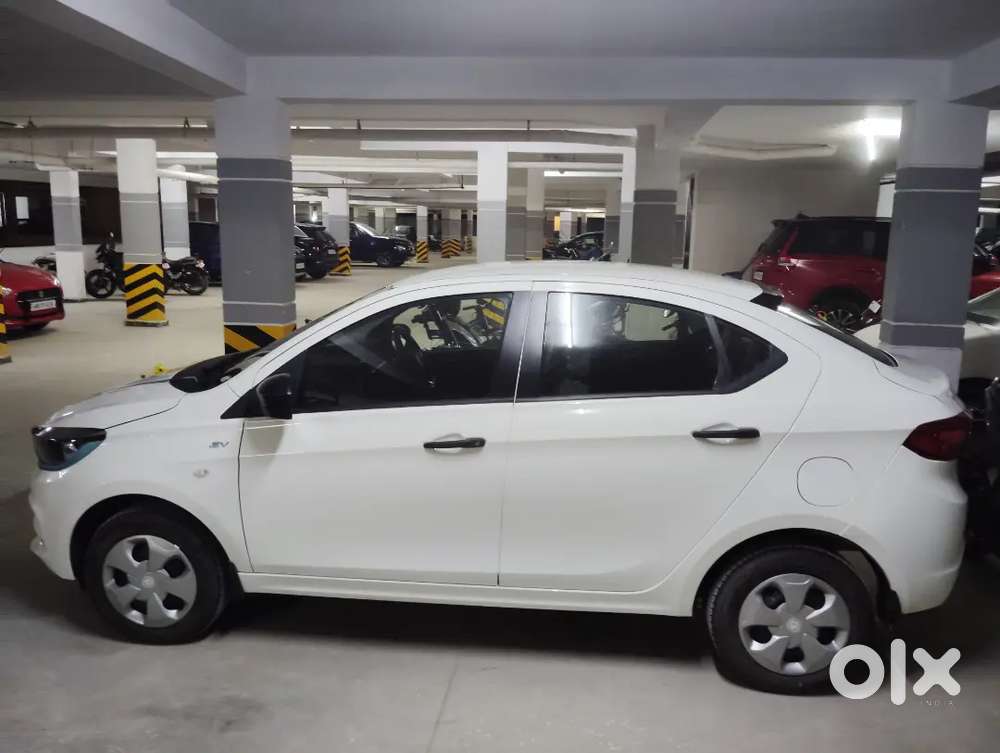 Tata Tigor Xpresst Ev Cab Yellow Board.