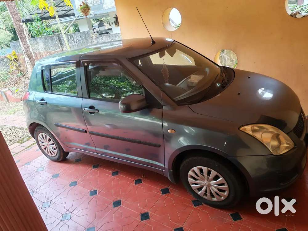 Maruti Suzuki Swift Lxi 2011