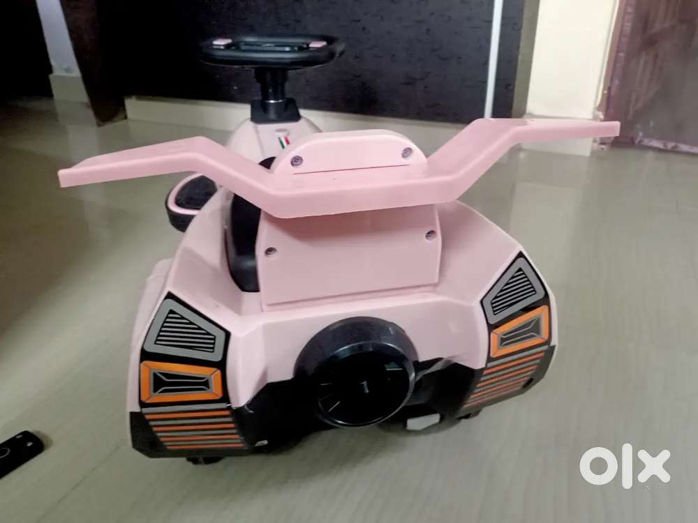 Brand New Kids Lambo Rider 2-in-1 Swing Car (Pink) - Unused Gift