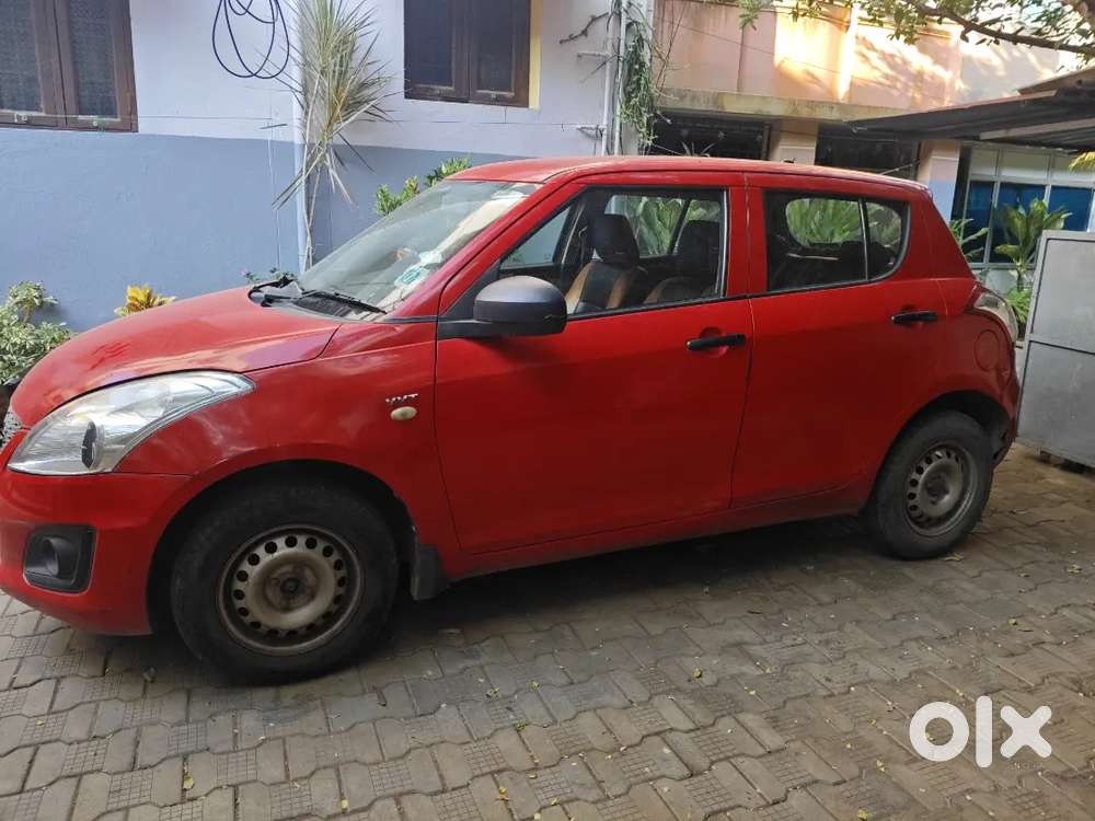 Maruti Suzuki Swift Lxi 2014