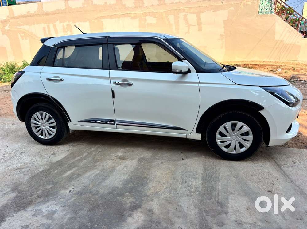 Maruti Suzuki Swift Vxi (o) 2024