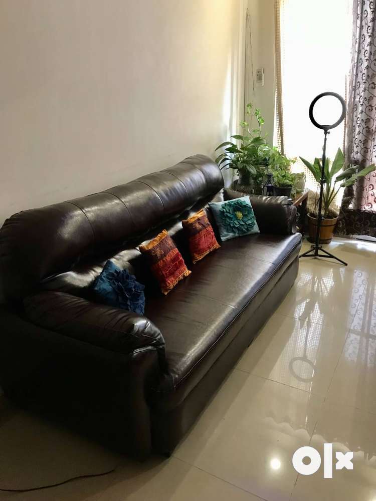 Olx leather deals sofa set