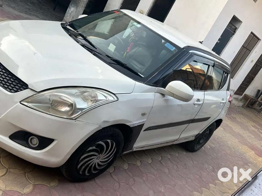 Maruti Suzuki Swift Lxi 2012