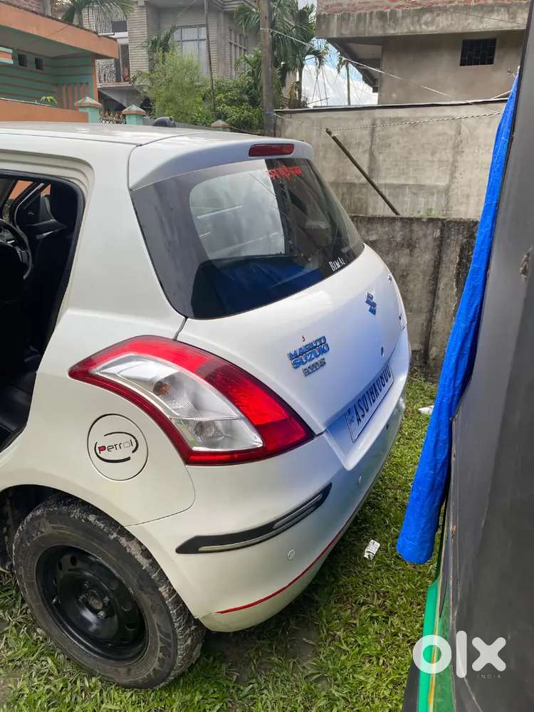 Maruti Suzuki Swift Lxi 2014