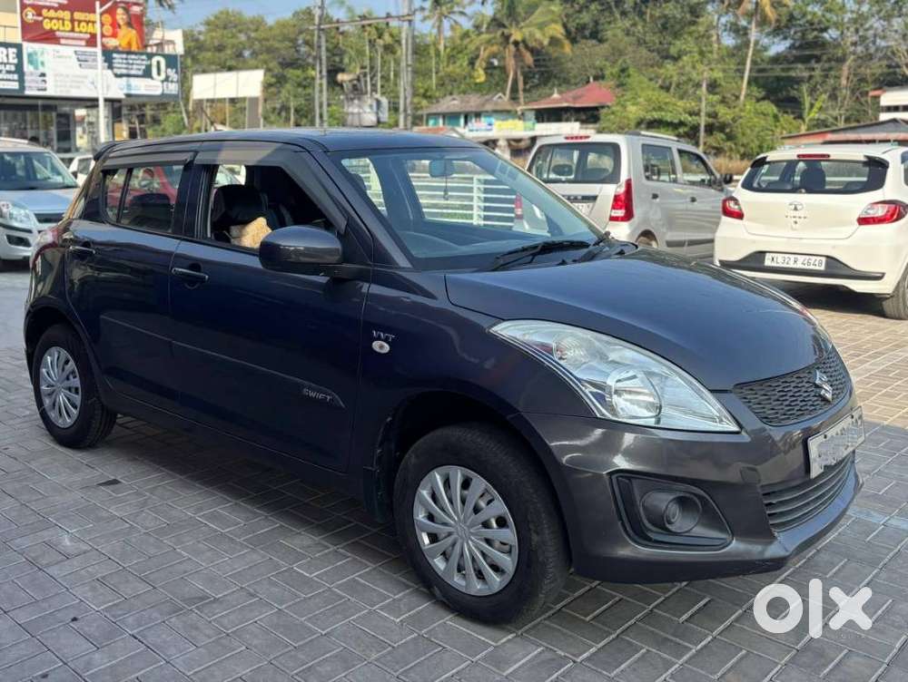 Maruti Suzuki Swift Lxi Optional-o, 2015, Petrol