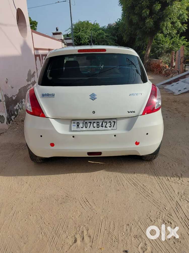 Maruti Suzuki Swift Lxi 2014
