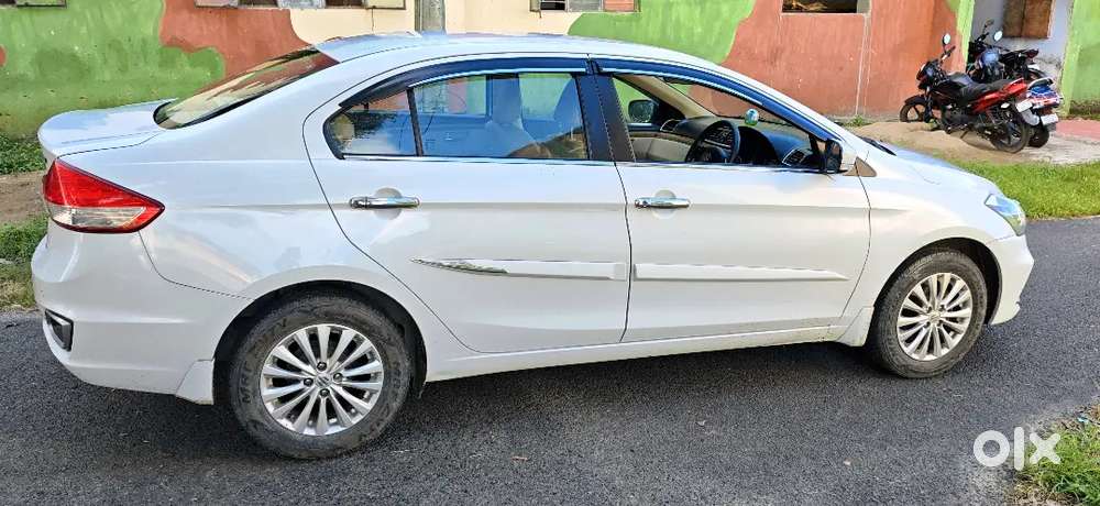 Well-maintained Ciaz Delta Hybrid White 35k Kms Alloy Wheels