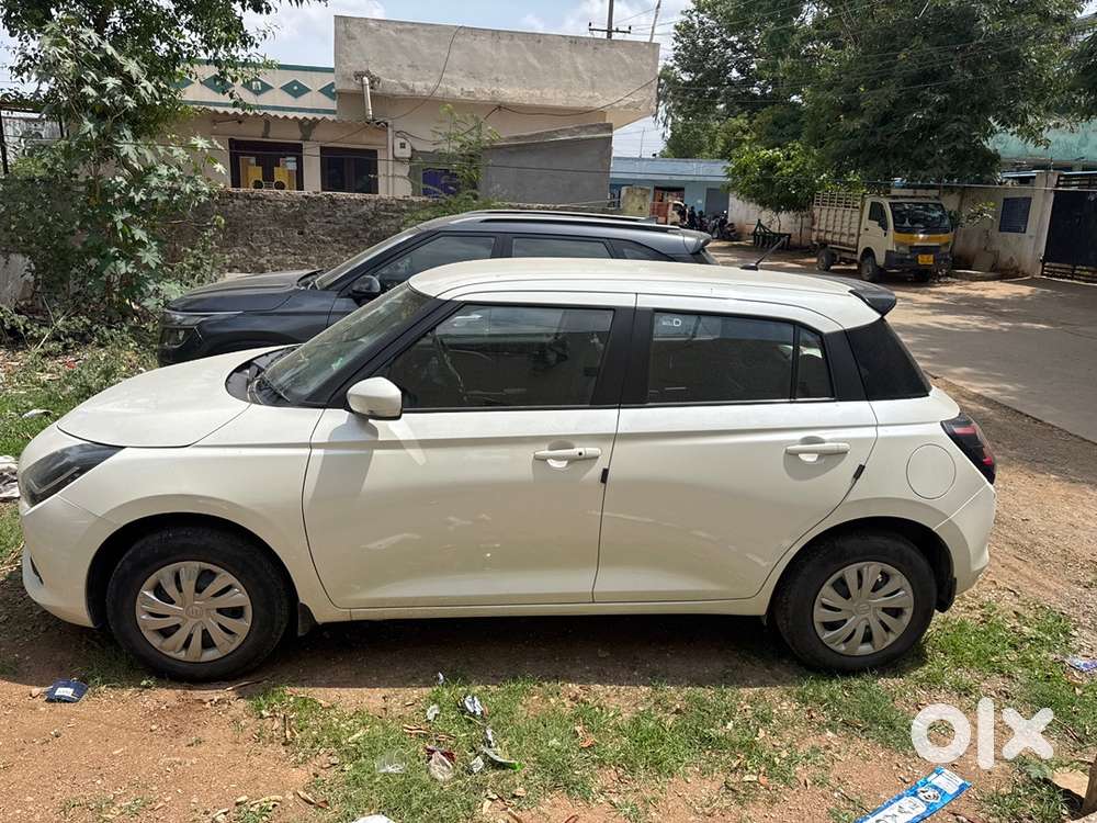 Maruti Suzuki Swift 2024 Vxi O