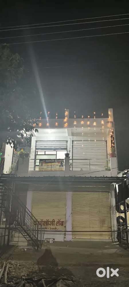 Shop on raod 1st floor 16000/- rent