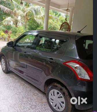 Maruthi Swift Hatchback Vxi O Bsiv  1.2 L Petrol Manual