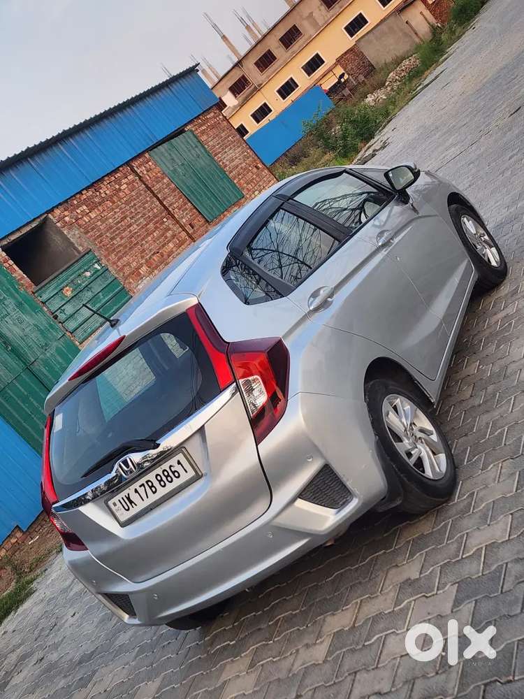 Honda Jazz V 
Power Windows 
Power Steering 
Power Break
