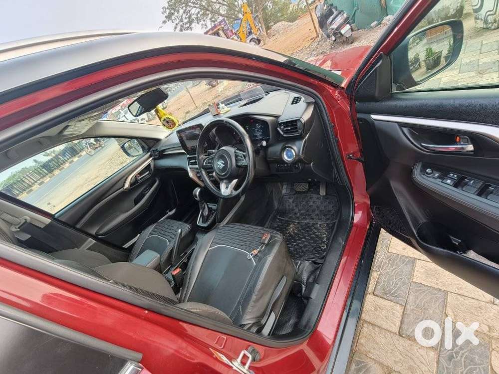 Maruti Suzuki Grand Vitara 1.5 Zeta Plus Dual Tone Intelligent Hybri..