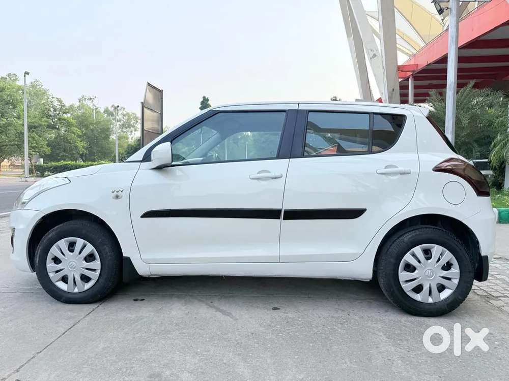 Maruti Suzuki Swift Lxi Optional-o, 2016, Petrol