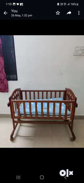 Baby wooden cheap cradle olx