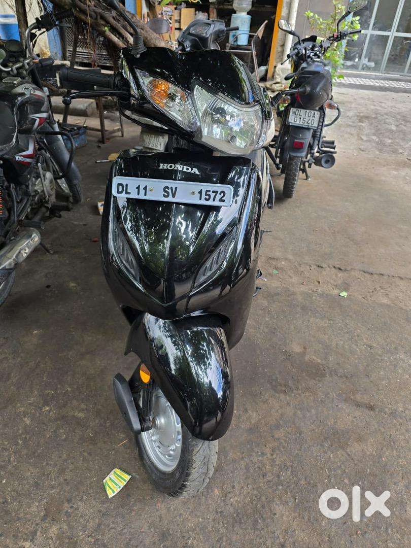 activa i scooty price