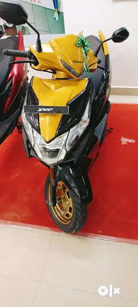 Dio bike yellow online colour price