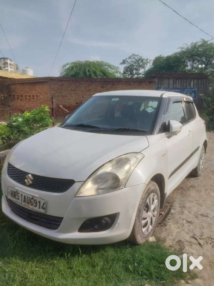 Maruti Suzuki Swift Lxi 2014