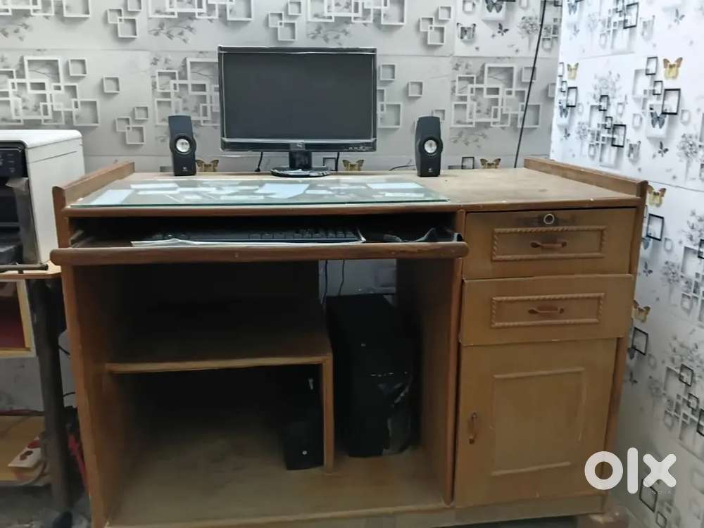 Big wooden computer table.