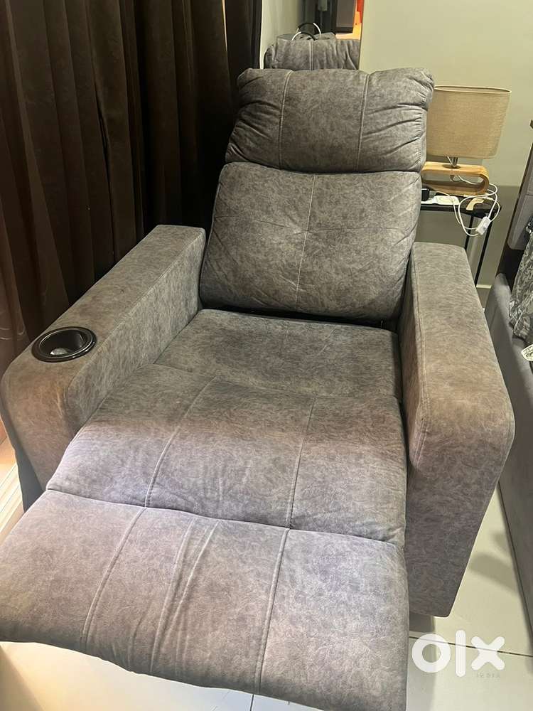 Plush fabric single seater recliner chair with cup holder