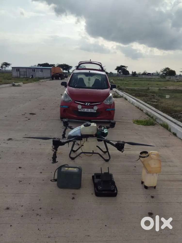 Agriculture Drone And Eon Car Petrol And Lpg