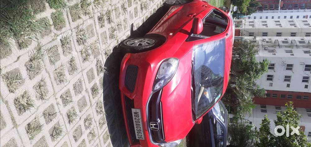 Honda Brio . Vx Mt . 9 Yrs . 12000 Km Driven.