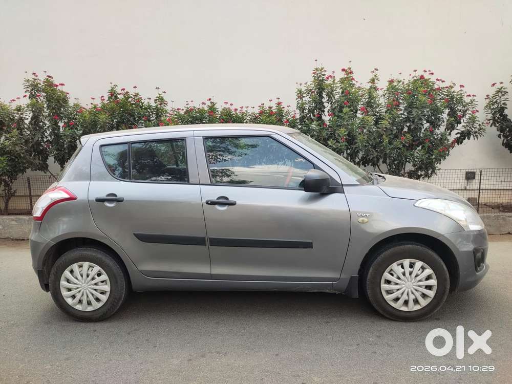 Maruti Suzuki Swift Lxi Optional-o, 2016, Petrol