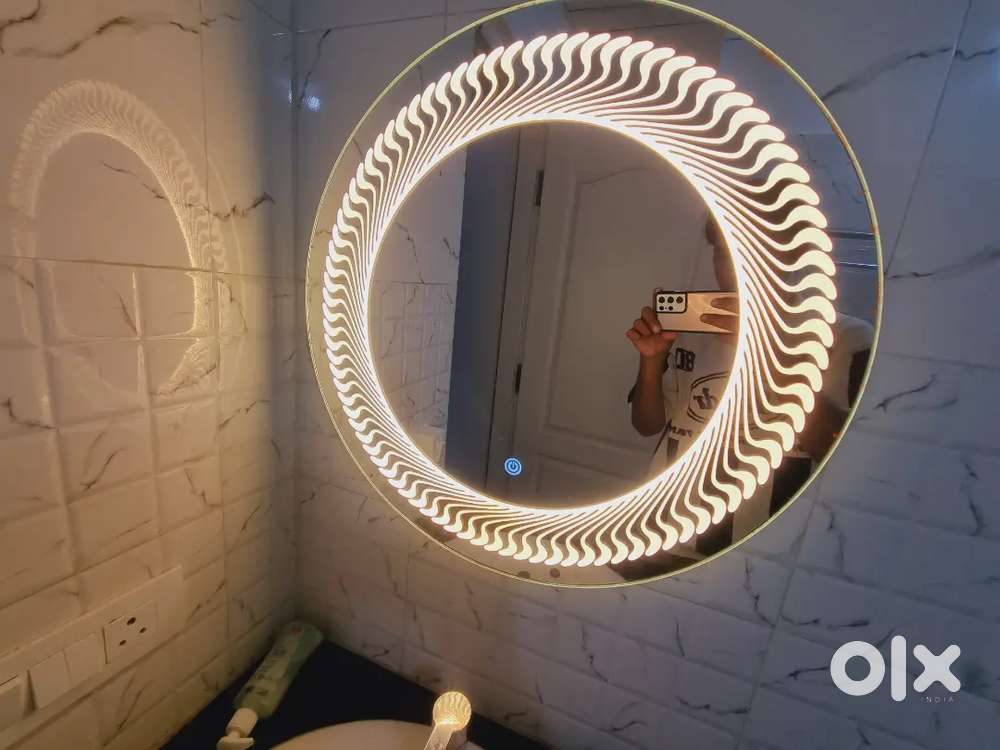Mirror with touch light