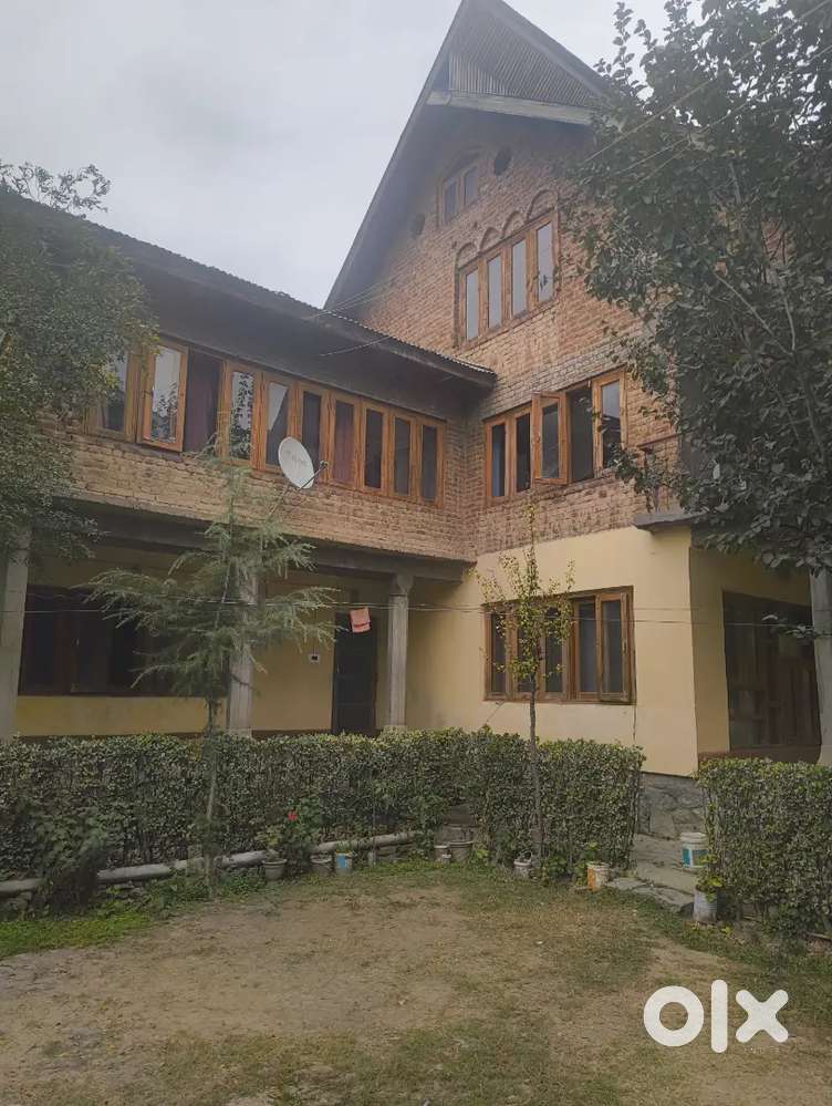 Prime 27-Marla Property: 3 Separate Houses (Two 3-Storey & One Single-