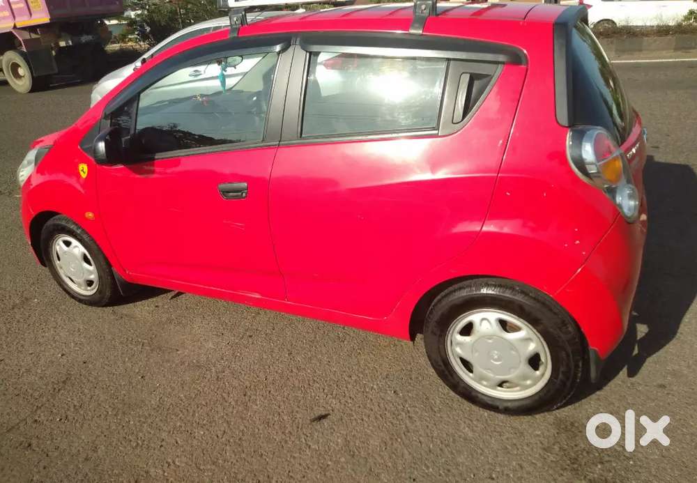 Beat Red 2013 Petrol Lpg New
Car Top Carrge No Only Car 
Condition
