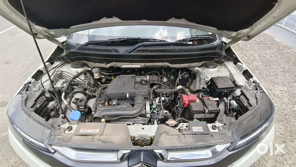 Maruti Suzuki Brezza 1.5 Lxi Smart Hybrid, 2024, Petrol