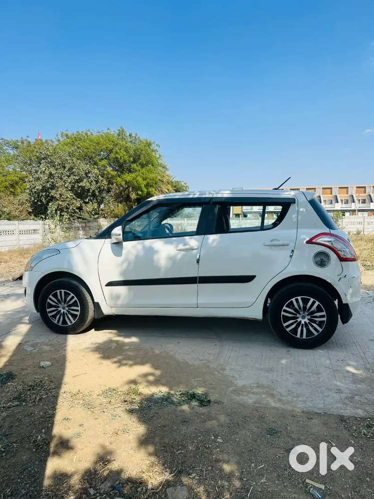 Maruti Suzuki Swift Lxi 2013