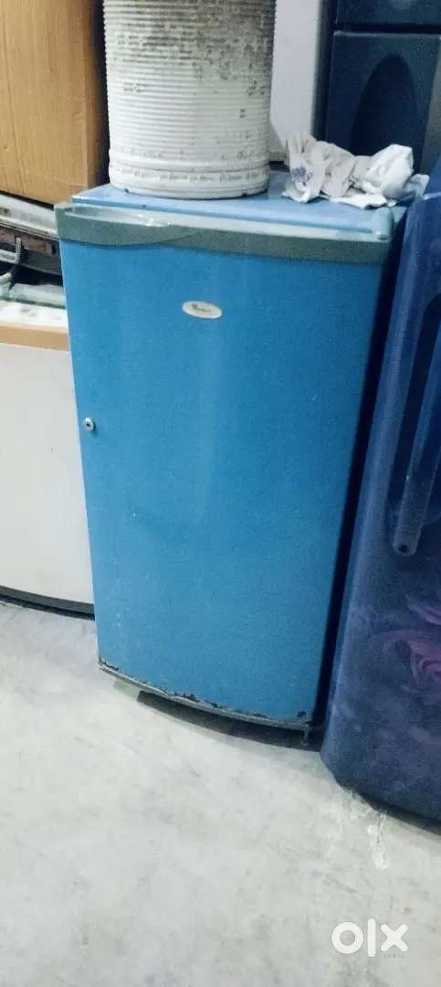 Blue colour single door fridge ok running condition