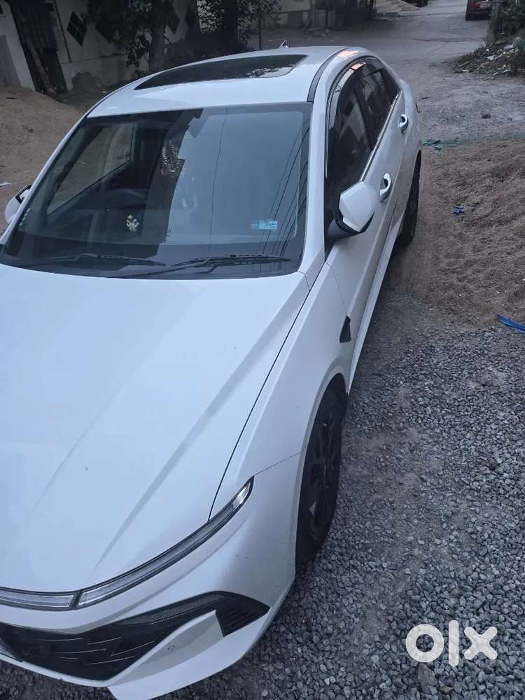 2 Years Old Well Maintaned Top End Verna Turbo Dct With 23k Driven.