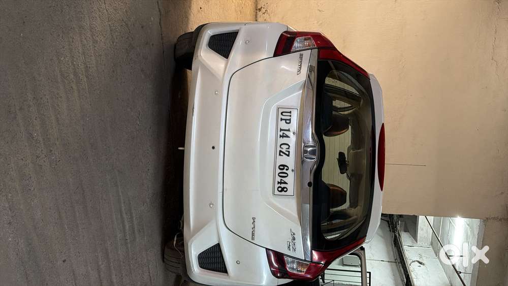 White Honda Jazz Available For Immediate Selling