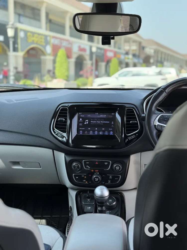 Jeep Compass 4x4 Next To Showroom