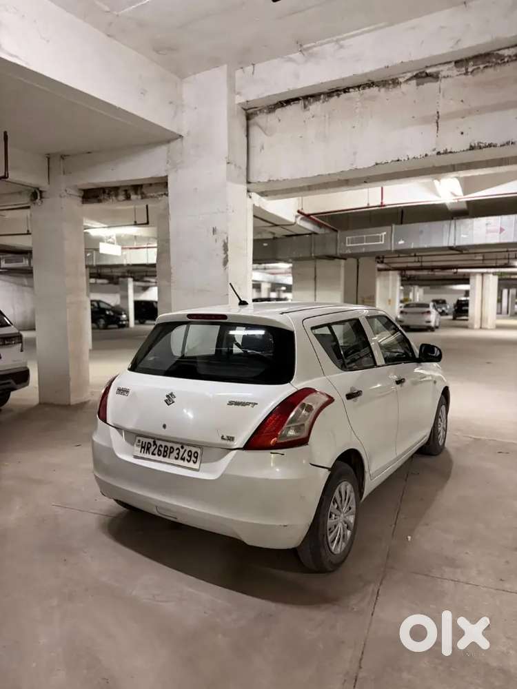 White Swift Single Hand 121500 Kms Petrol