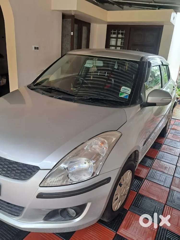 Maruti Suzuki Swift 2013 S Silver Petrol 59000 Km Driven