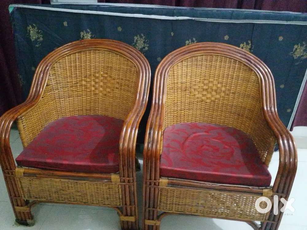 Wooden sofa set five seater with a table.