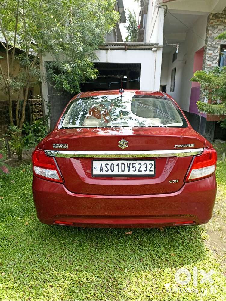 Maruti Suzuki Dzire ( Gallant Red). First Owner