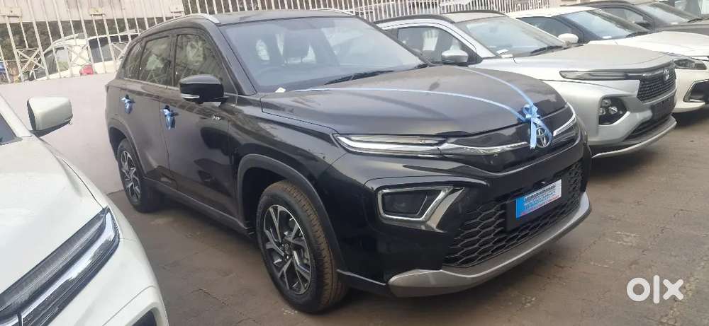 Toyota New Hyryder With Scooty Free In It.