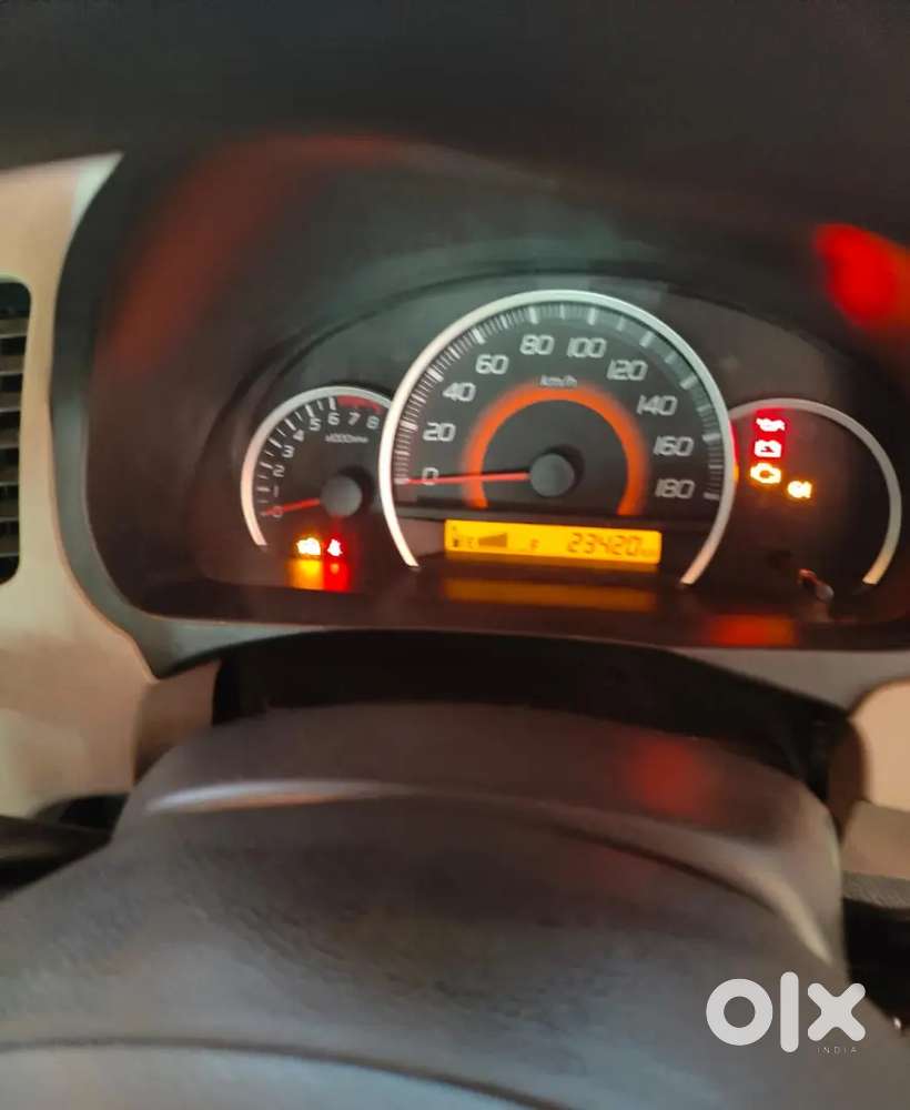 Wagon R Vxi Low Km Fancy Number Single Owner Golden Colour