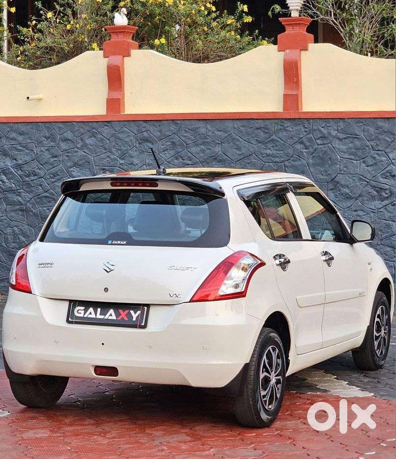 Maruti Suzuki Swift Lxi Optional-o, 2015, Petrol