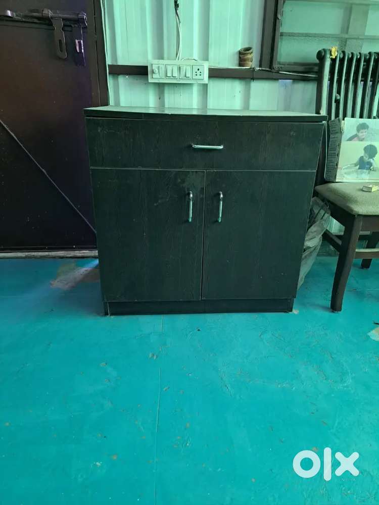 Table with storage unit