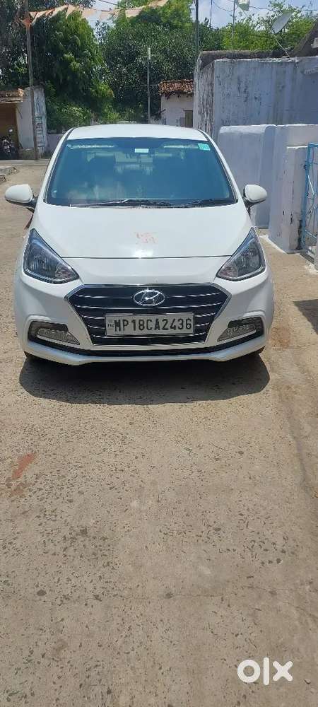 Hyundai Xcent Cng + Petrol  40,000 Km  32 Km/kg Mileage  Excellent