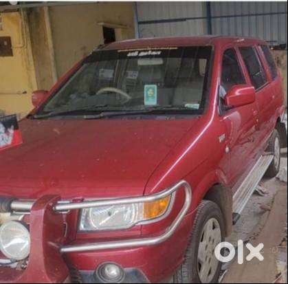 Well Maintained 2012 Red Tavera 10 Seater For Sale