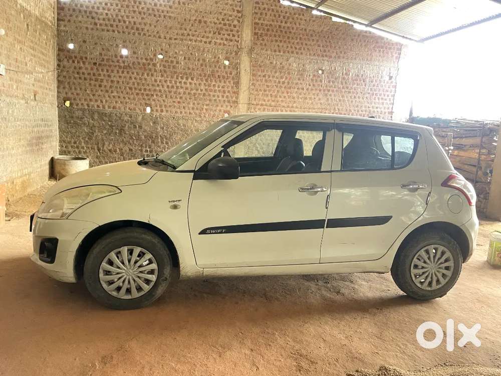 Swift 1.2 Lxi 2016 Petrol 140000 Km